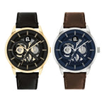 Two luxury men's wristwatches: one gold with a black dial and strap, one silver with a blue dial and brown leather strap.