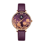 Elegant women's rose gold watch with purple leather strap and floral dial design
