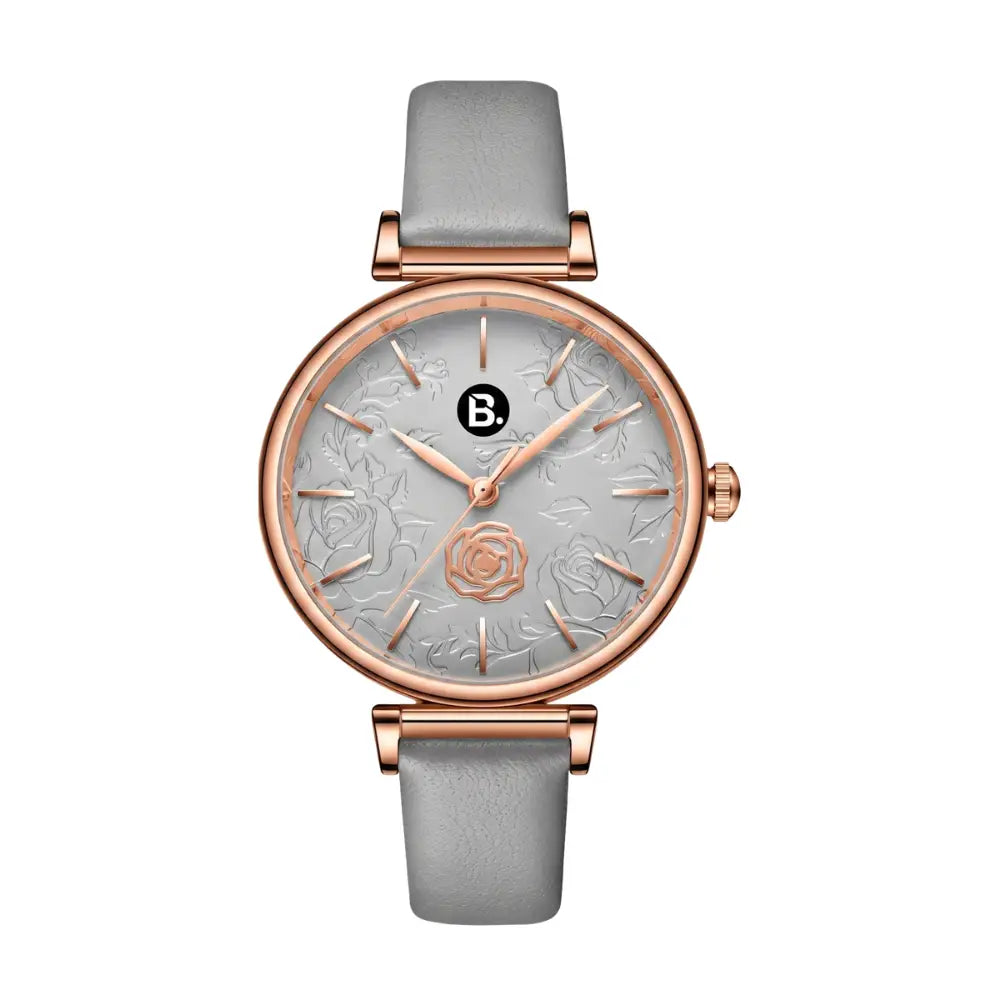 Rose gold women's watch with floral embossed dial and grey leather strap