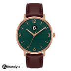 Elegant women's wristwatch with a dark green dial, rose gold case, and brown leather strap.