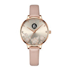 Elegant rose gold women's watch with floral dial design and pink leather strap.