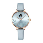 Elegant light blue women's wristwatch with rose gold case and floral dial details.