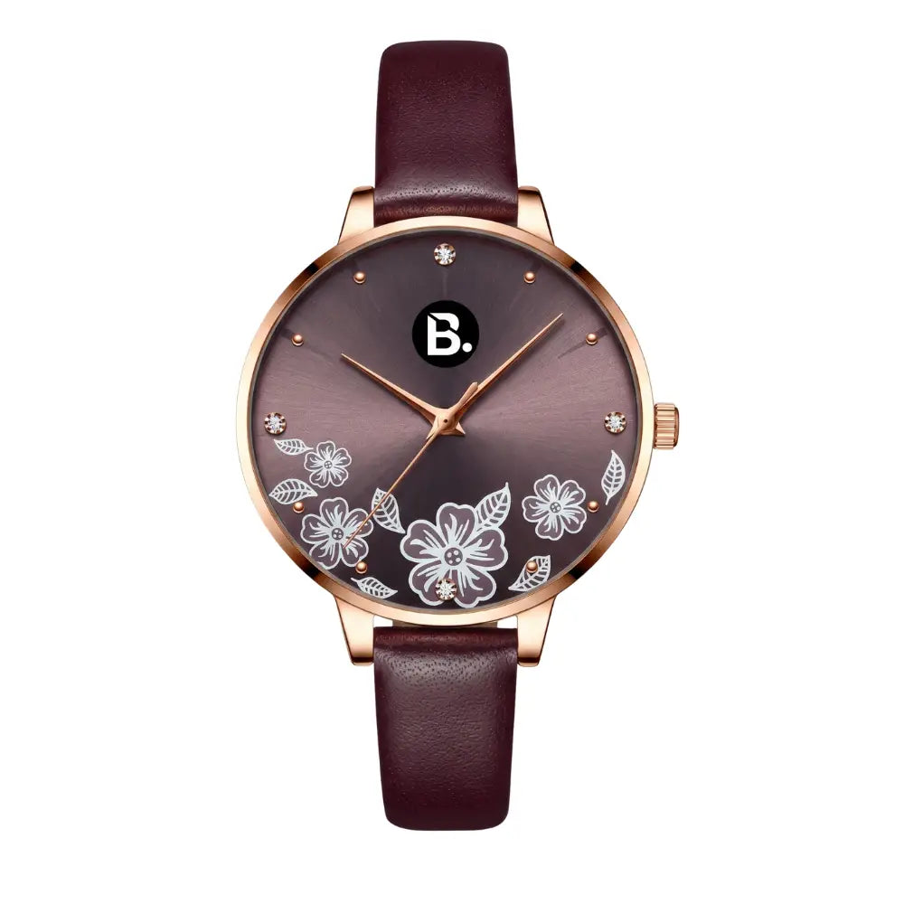 Elegant rose gold women's watch with floral design and burgundy leather strap.