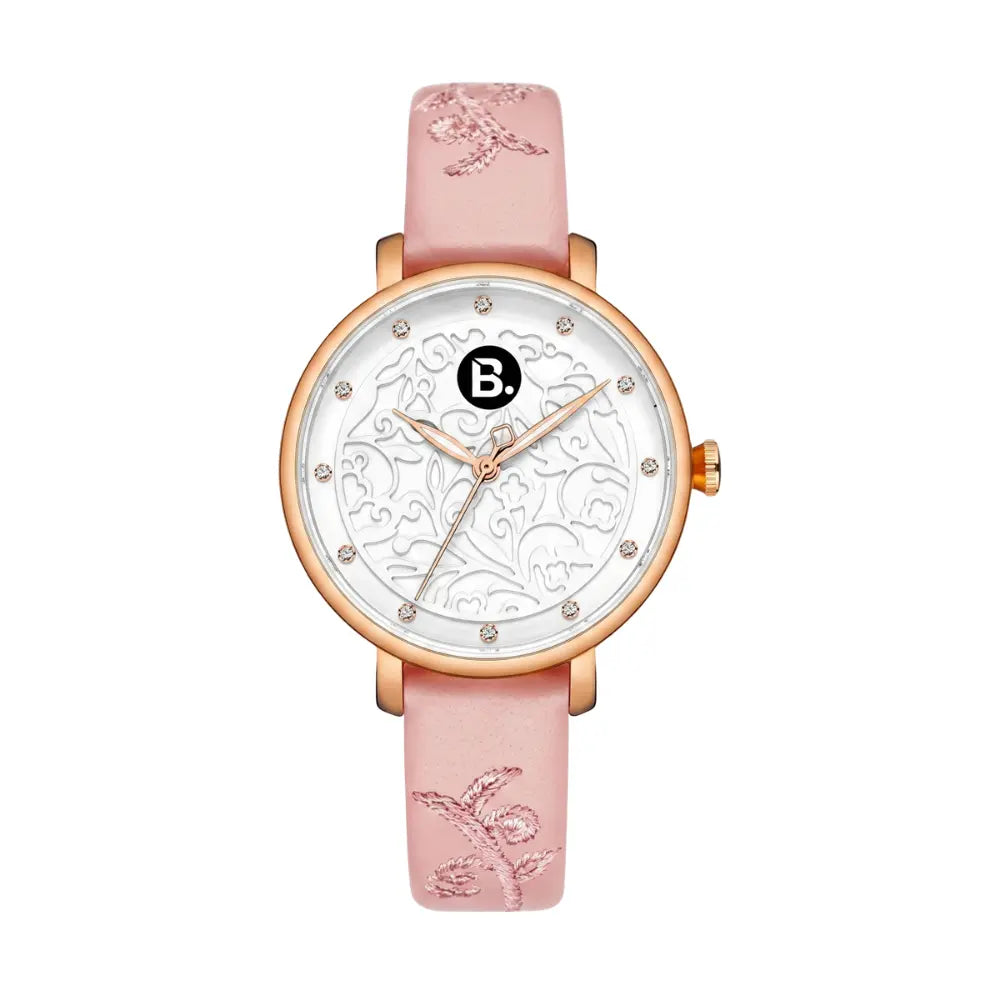 Elegant rose gold women's watch with white floral dial and pink embossed leather strap