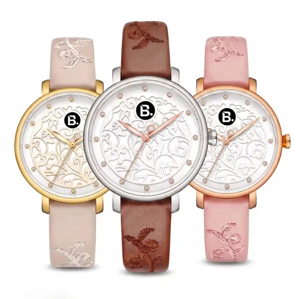Three elegant women's watches with floral embossed dials and leather straps in gold, silver, and rose gold.