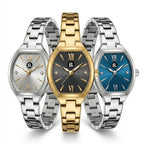 Three elegant women's watches with silver, gold, and blue dials and metal link bracelets.
