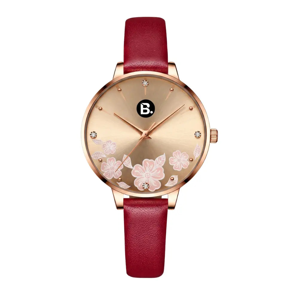 Rose gold women's watch with floral design and red leather strap