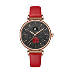 Elegant rose gold women's watch with black floral dial and red leather strap
