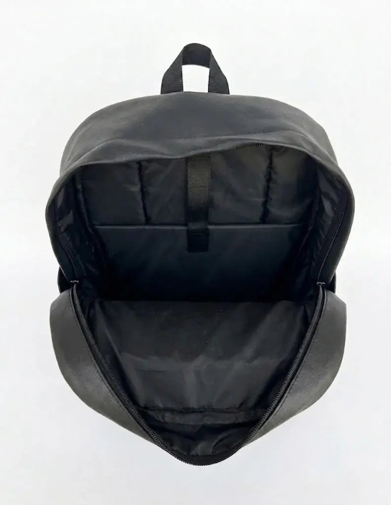 Open black backpack showing spacious interior compartment and organizer pockets.